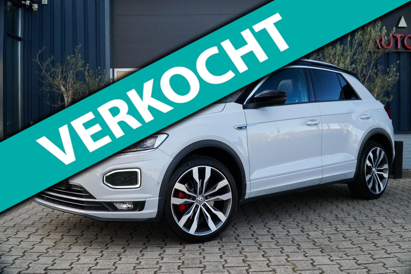 Volkswagen T-Roc - 2.0 TSI 4Motion Sport Business R 190PK! PANO|BEATS|TREKHAAK - AutoWereld.nl