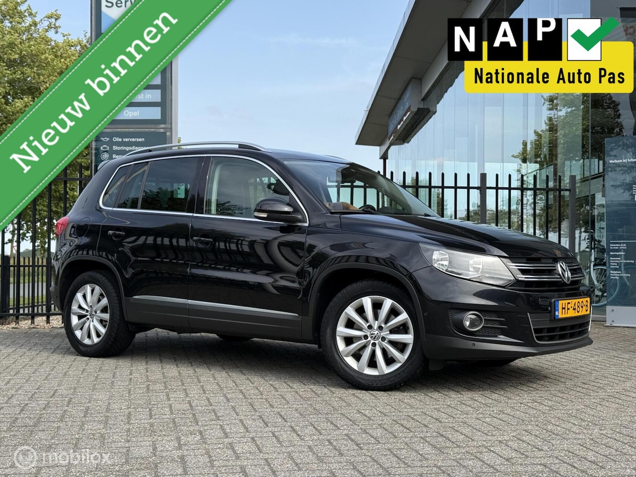 Volkswagen Tiguan - 1.4 TSI Sport&Style | Navi | Cruise | Park - AutoWereld.nl