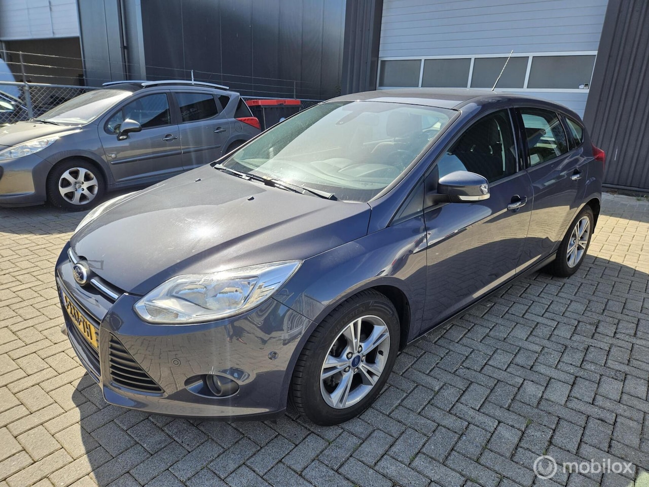Ford Focus - 1.0 EcoBoost Lease Titanium EXPORT/HANDEL TIK IN DE MOTOR - AutoWereld.nl