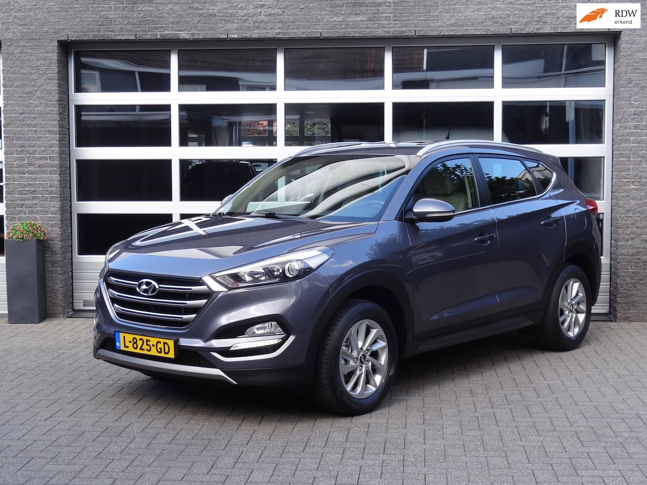 Hyundai Tucson - 1.6 GDI Comfort 1.6 GDi Comfort ,leder interieur, navigatie etc.. - AutoWereld.nl