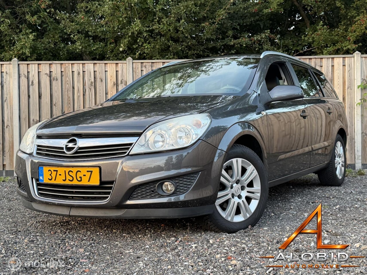 Opel Astra Wagon - 1.6 Edition Leder | Navi | Cruise | PDC | stoelverwarimg - AutoWereld.nl