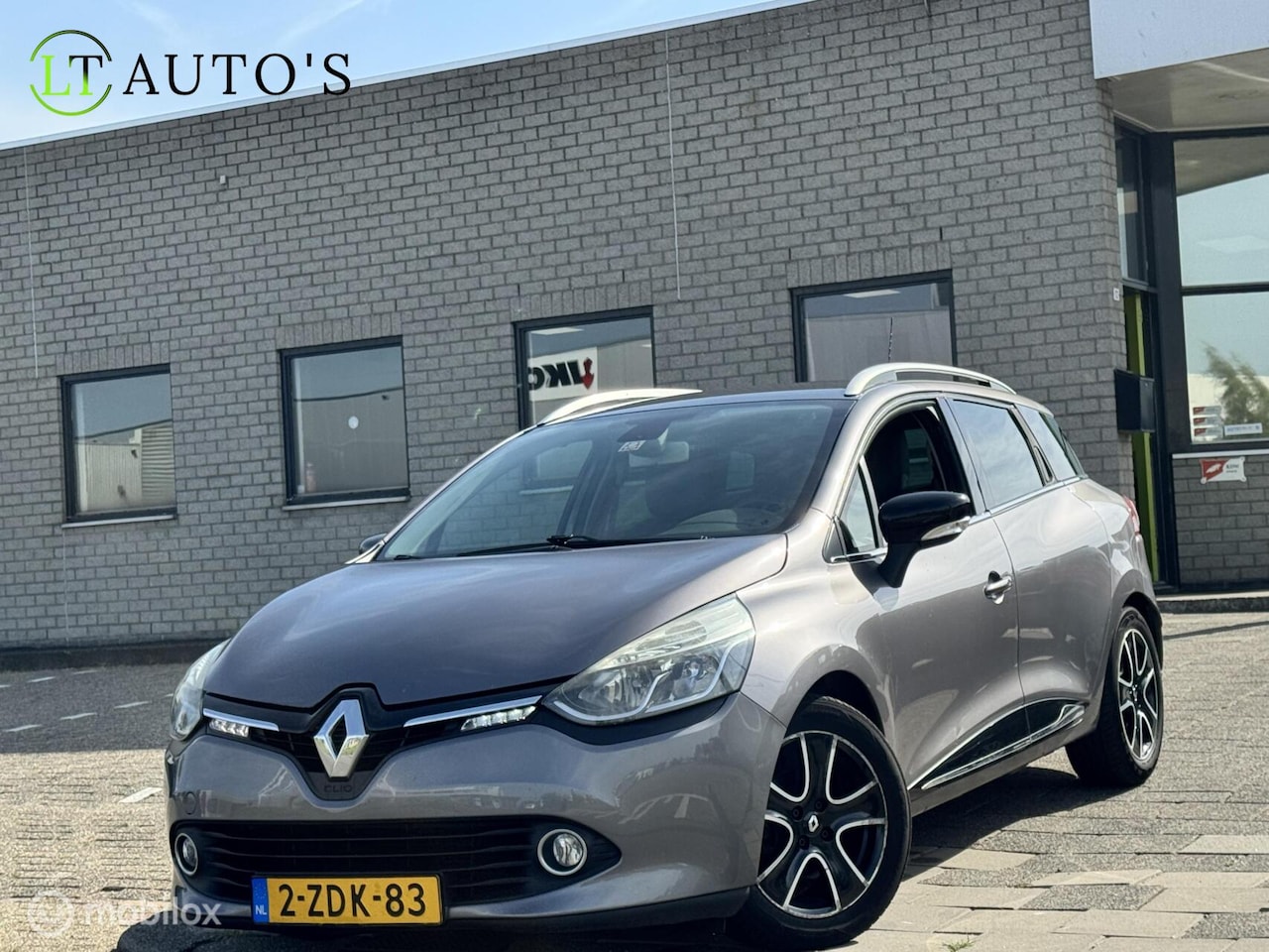 Renault Clio Estate - 1.5 dCi ECO Dynamique|Leer Navi Clima - AutoWereld.nl