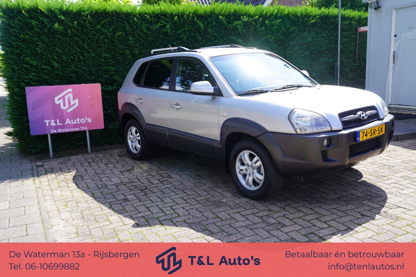 Hyundai Tucson - 2.0i Dynamic World Cup edition 2.0i Dynamic World Cup edition - AutoWereld.nl