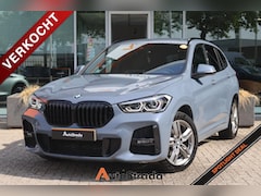 BMW X1 - (f48) sDrive18i M-Sport | Stormbay | LED | Navigatie | Cruise | Climate | Sfeerverlichting