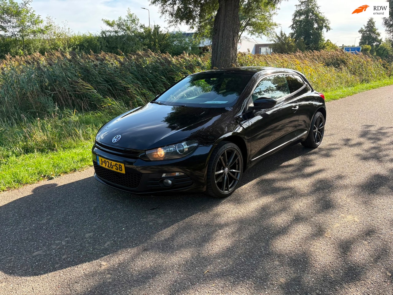 Volkswagen Scirocco - 1.4 TSI Highline Plus Airco Cruise Navi Pdc - AutoWereld.nl