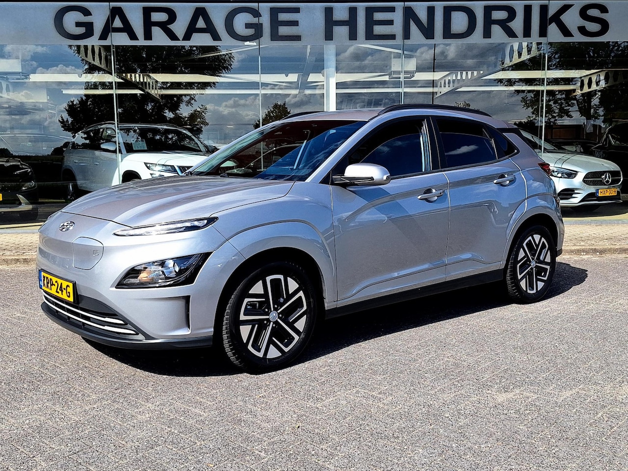 Hyundai Kona Electric - EV Comfort Smart 64 kWh | SOH: 97,3% | 3 Fase | Warmtepomp | Climate | Stoel-verwarming | - AutoWereld.nl