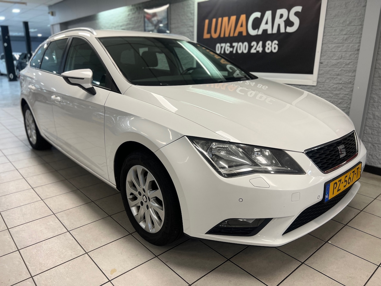 SEAT Leon ST - 1.2 TSI Reference Business | Navi | Cruise |PDC - AutoWereld.nl