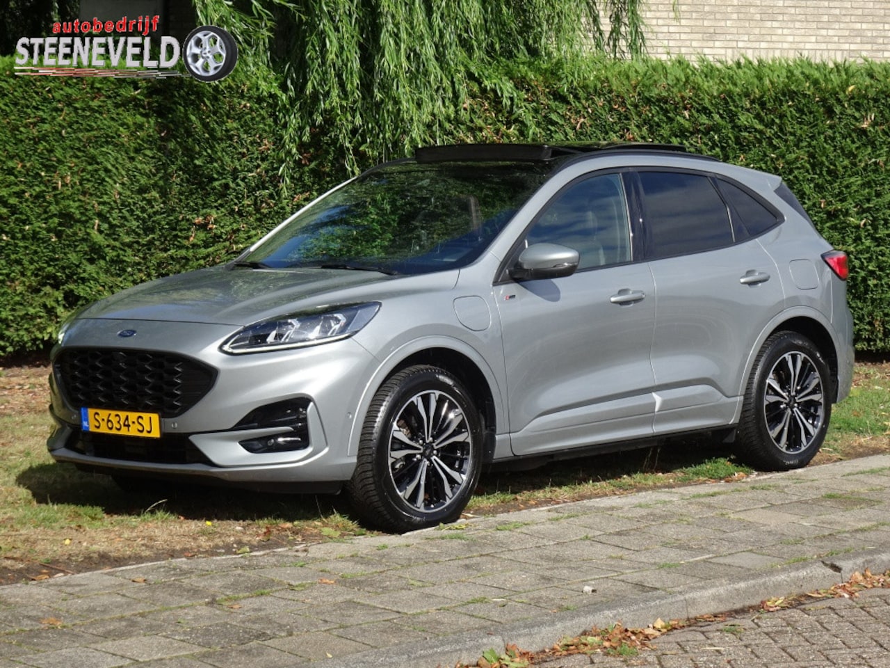 Ford Kuga - 2.5 PHEV ST-Line X met Panodak AGR Stoelen en Trekhaak - AutoWereld.nl