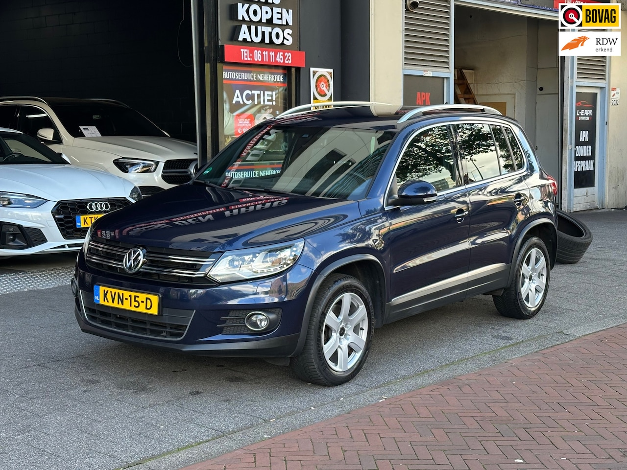 Volkswagen Tiguan - 1.4 TSI Sport&Style Automaat Clima Camera - AutoWereld.nl