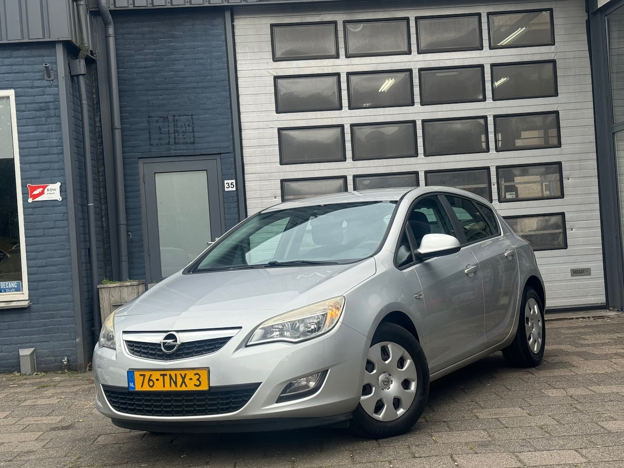 Opel Astra - 1.4 Turbo Business Edition | Clima | Cruise | Navi | N.A.P - AutoWereld.nl
