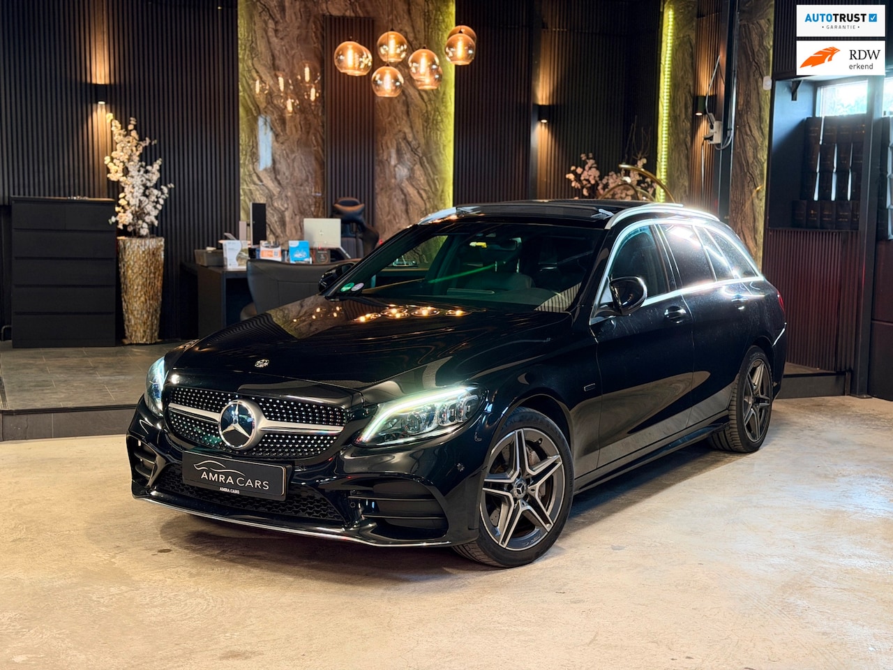 Mercedes-Benz C-klasse Estate - 300 e AMG Line|Pano|Sfeer|Bomvol! - AutoWereld.nl