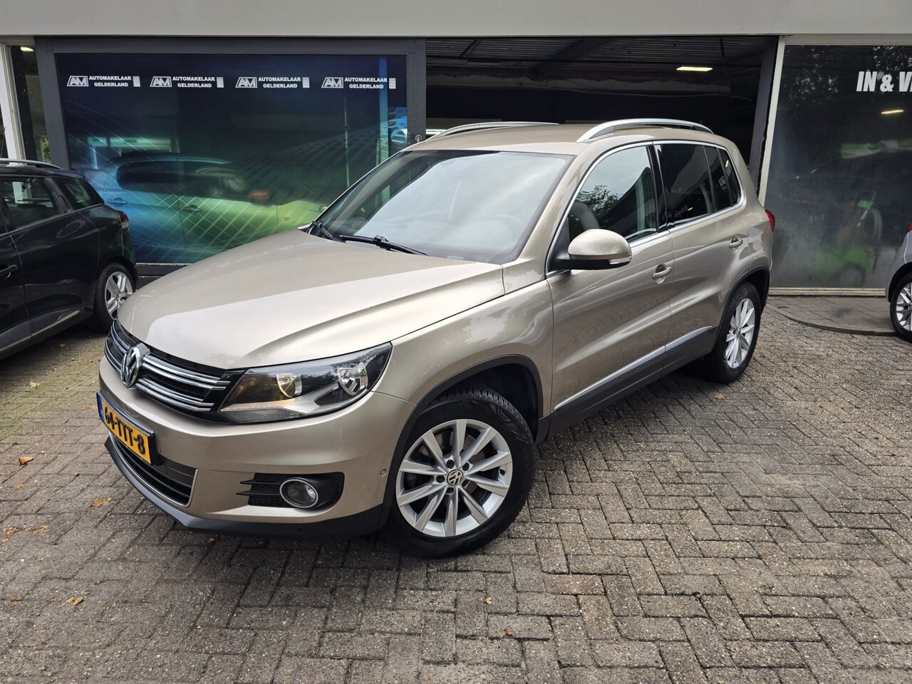 Volkswagen Tiguan - 1.4 TSI Sport&Style | 3/6 OF 12MND GARANTIE | NAVI | TREKHAAK | CRUISE | LMV | - AutoWereld.nl