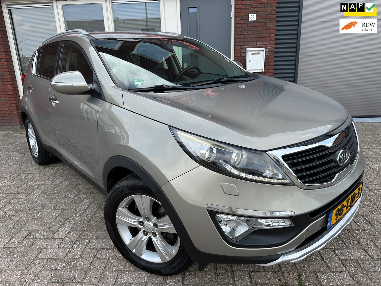 Kia Sportage - 1.6 GDI ISG X-clusive / Leder / Camera / Navi / PDC / LED / Cruise / Clima - AutoWereld.nl