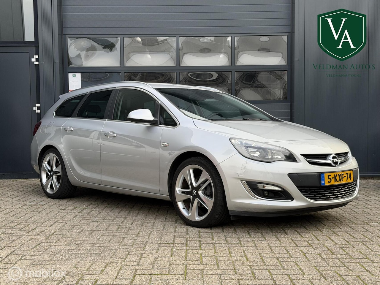 Opel Astra Sports Tourer - 1.4 Turbo Business 1.4 Turbo Business + - AutoWereld.nl