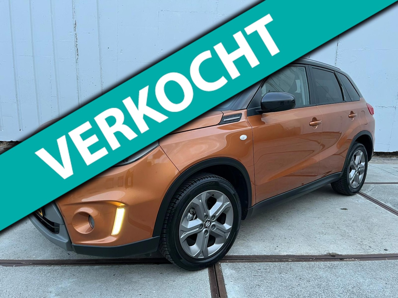 Suzuki Vitara - 1.6 Exclusive Clima - trekhaak - navi - CarPlay - stoelverwarming - Lm velgen - privacy gl - AutoWereld.nl