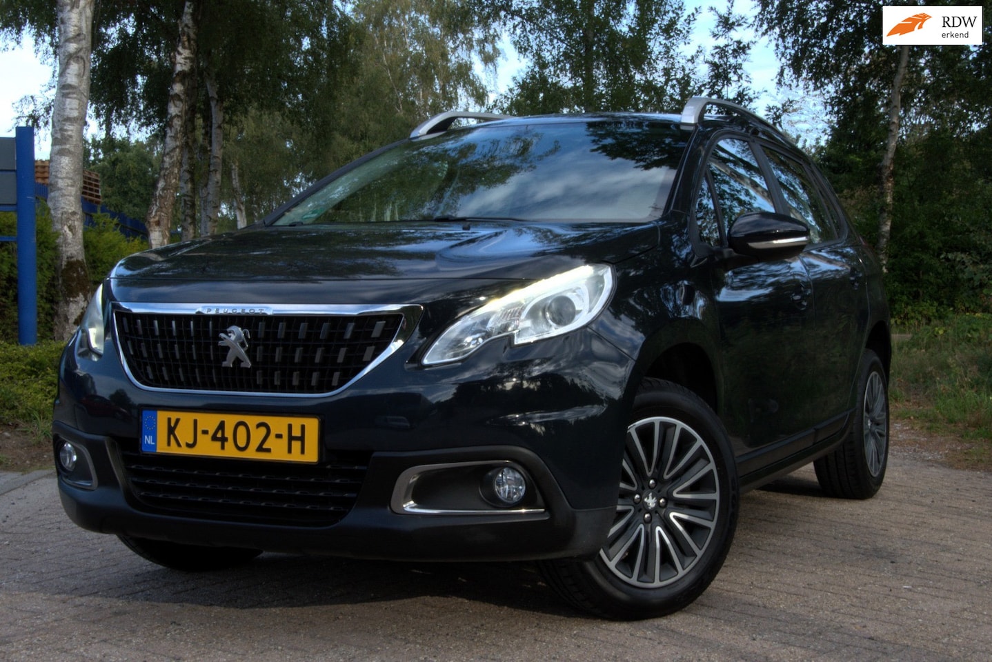 Peugeot 2008 - 1.2 PureTech Blue Lion NAP, Airco, Cruise, Navi, PDC. - AutoWereld.nl