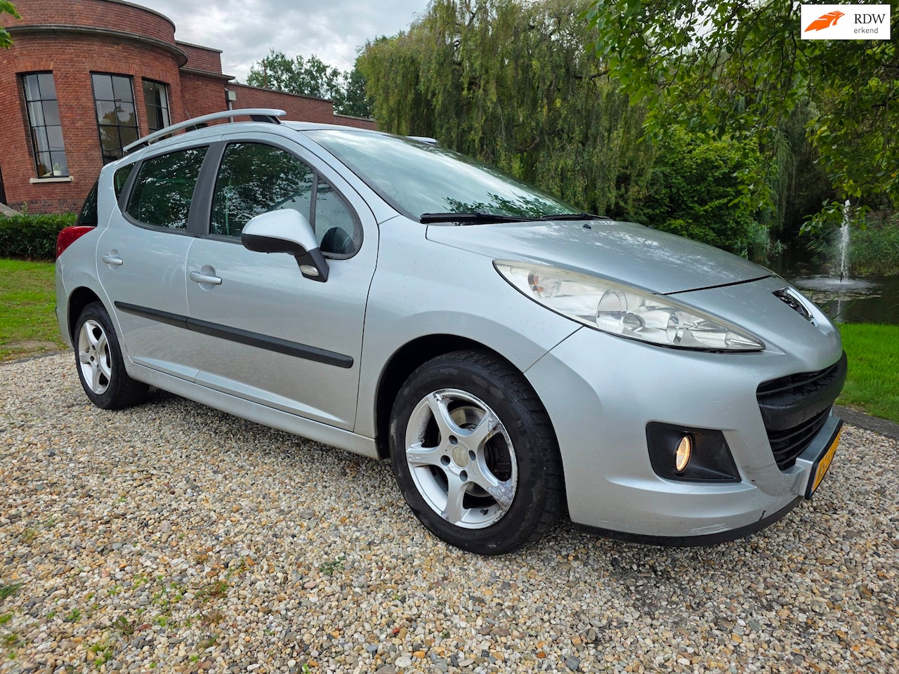 Peugeot 207 SW - 1.4 VTi Blue Lease Executive 1.4 VTi Blue Lease Executive - AutoWereld.nl