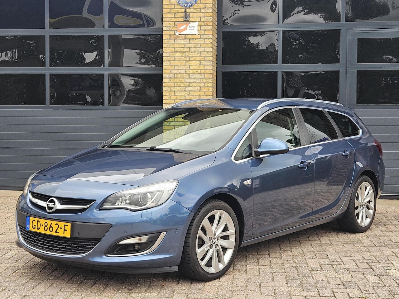 Opel Astra Sports Tourer - 1.4 Turbo Sport+ | Xenon | Leder | Navi | DAB+ - AutoWereld.nl