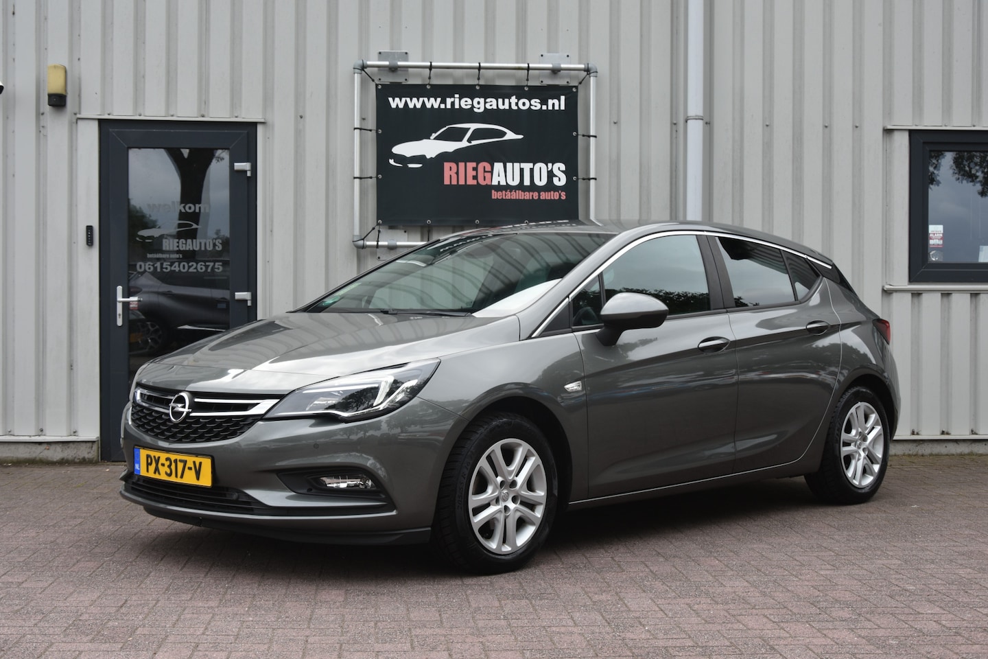 Opel Astra - 1.0 Business+. Trekhaak, Navigatie, PDC, Camera, Clima!! - AutoWereld.nl