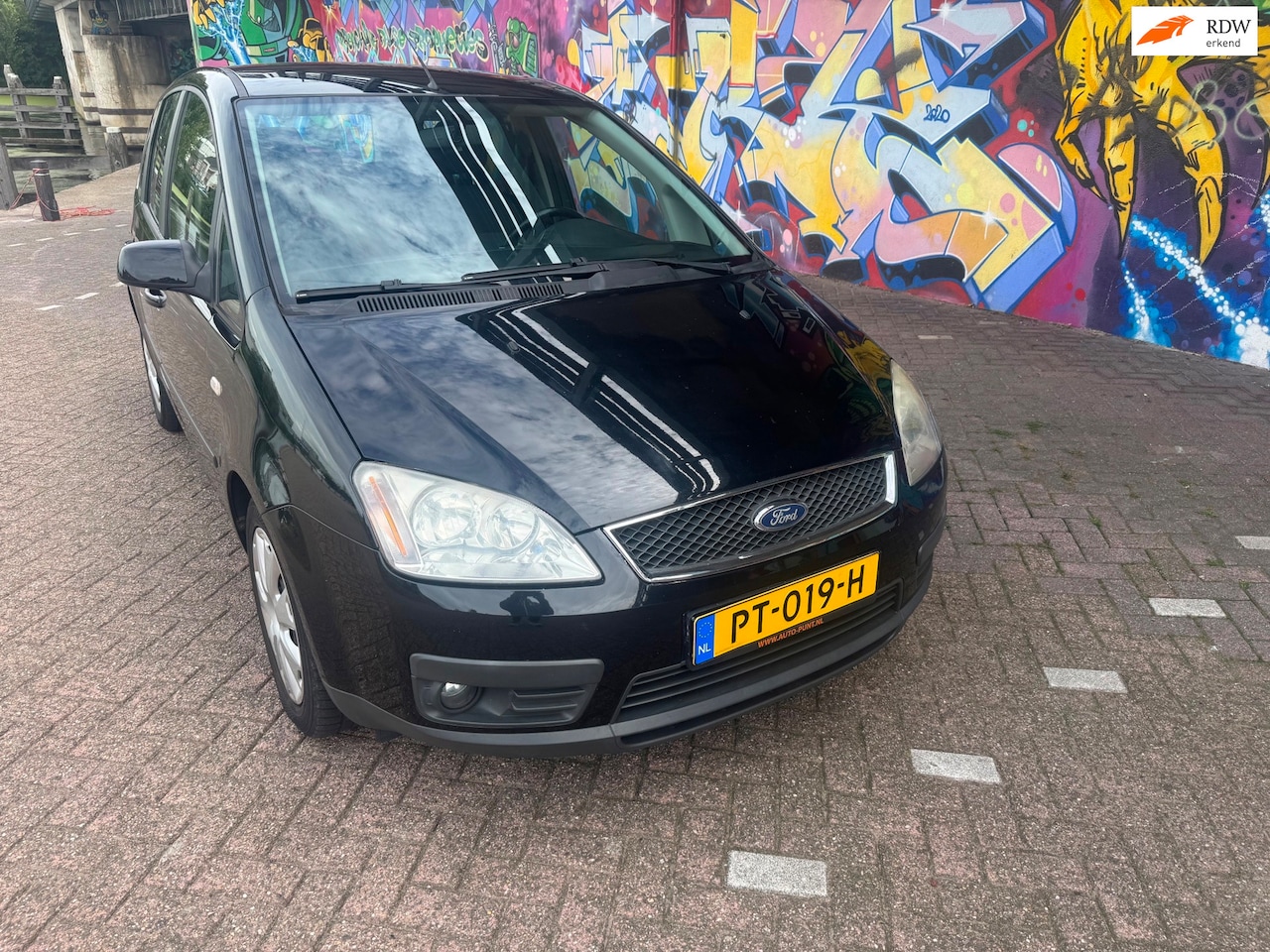 Ford Focus C-Max - 2.0-16V Trend nette auto werkende airco elektrische ramen zonne schermen apk aug 2027 - AutoWereld.nl