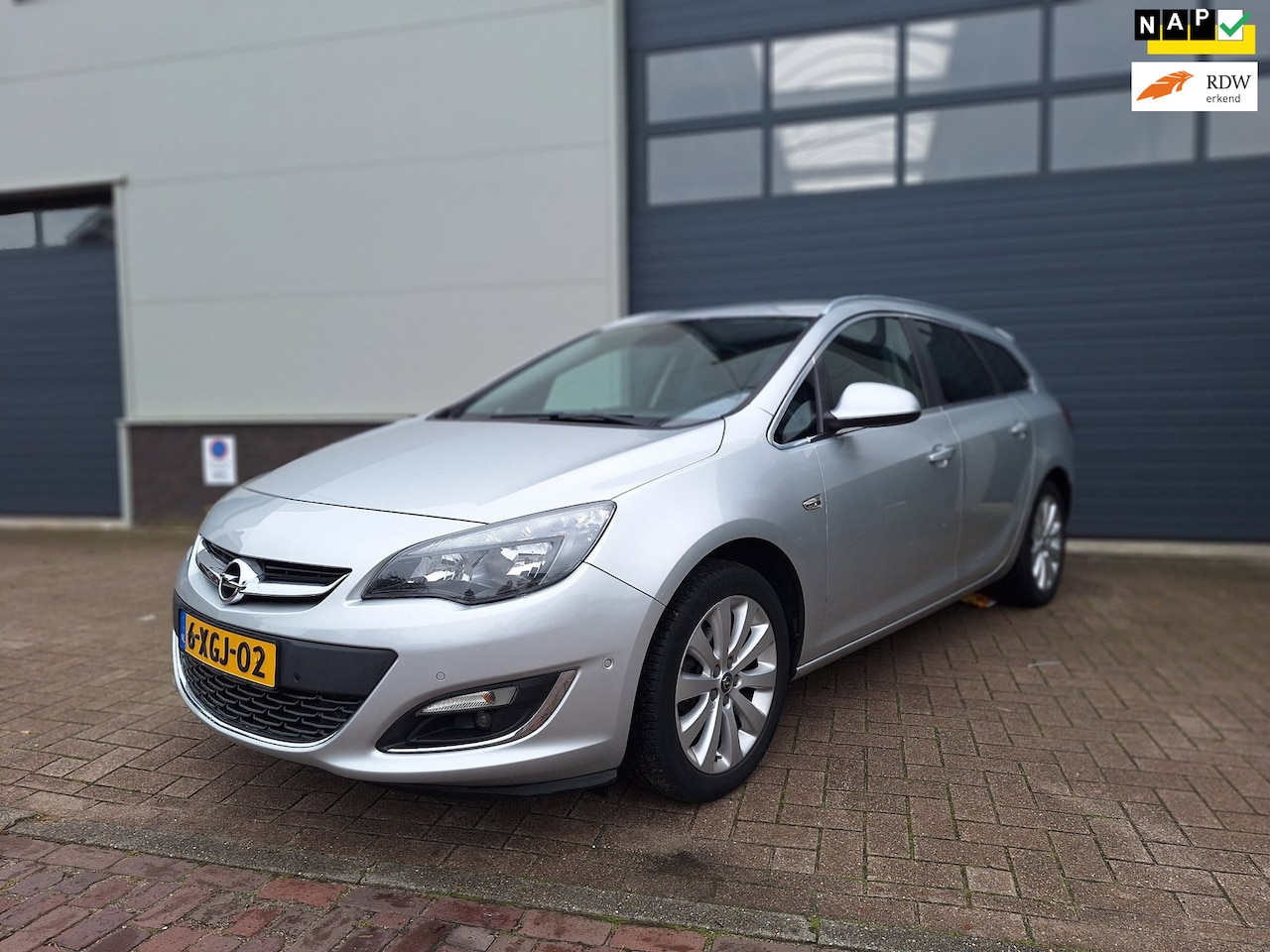 Opel Astra Sports Tourer - | 1.4 Turbo Cosmo | Camera | Cruise control | 2e eigenaar NAP | Airco | Navigatie | - AutoWereld.nl