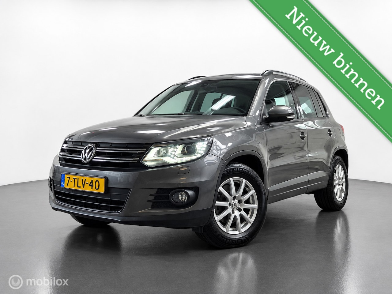 Volkswagen Tiguan - 1.4 TSI Comfort&Design, NAP, LED, Trekhaak - AutoWereld.nl