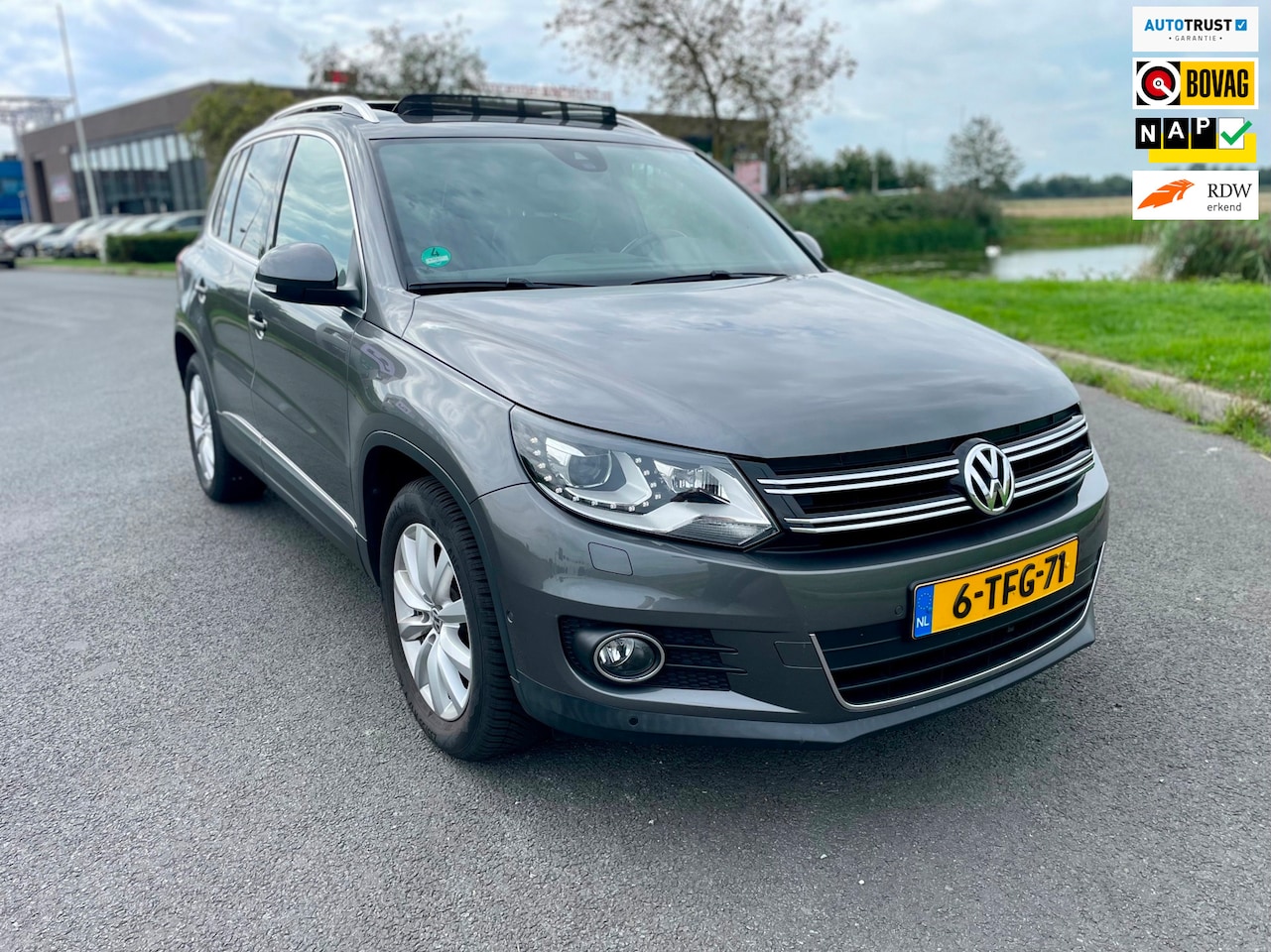 Volkswagen Tiguan - 1.4 TSI Sport&Style, Aut, 160pk, Trekhaak, Pano, Dynaudio, Cam, Leder, Stoelvrw, Nav, Geen - AutoWereld.nl