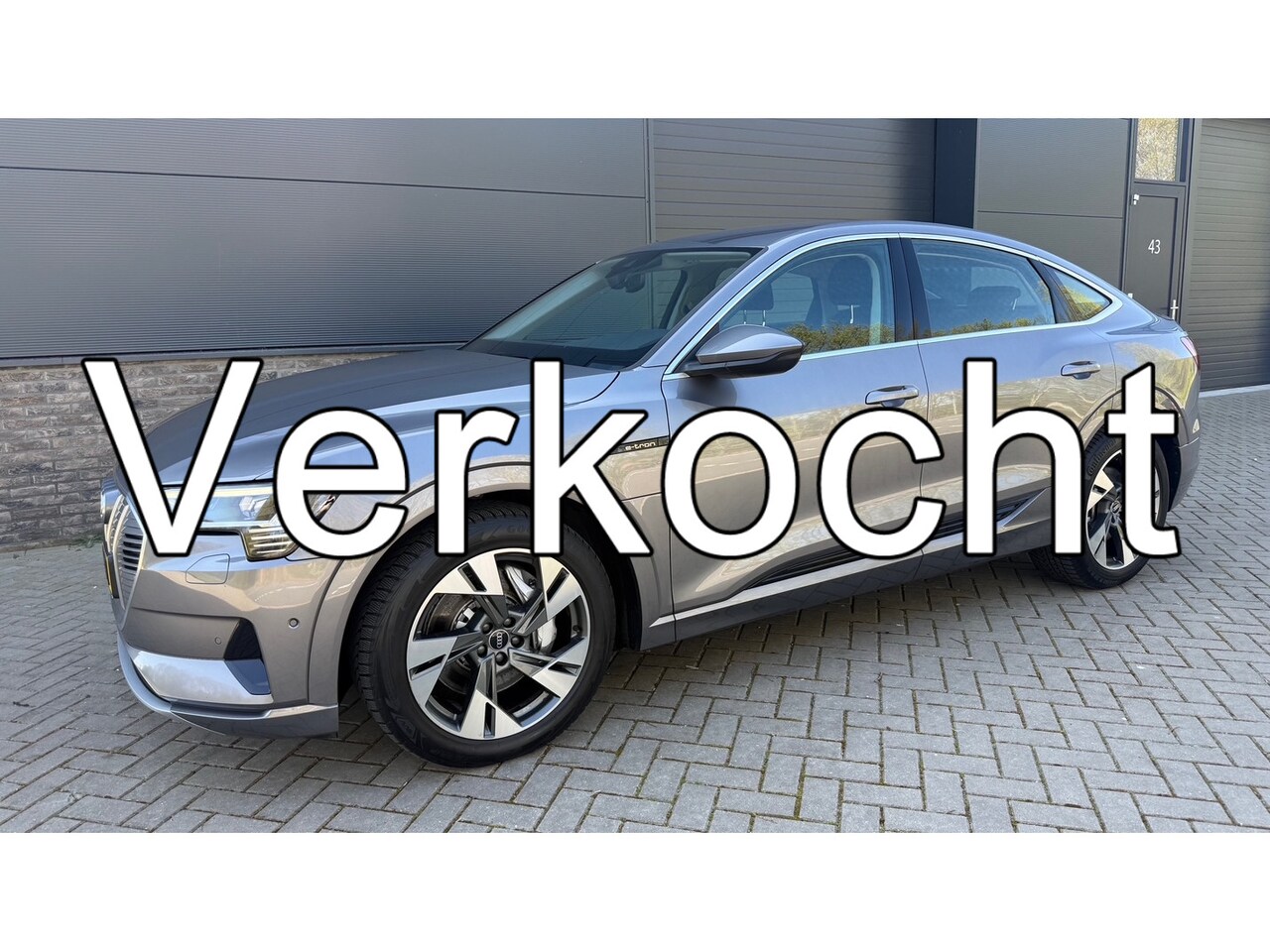Audi e-tron Sportback - 55 quattro Business edition 95 kWh SOH 92% / Interieurvoorverwarming / DAB / Luchtvering - AutoWereld.nl