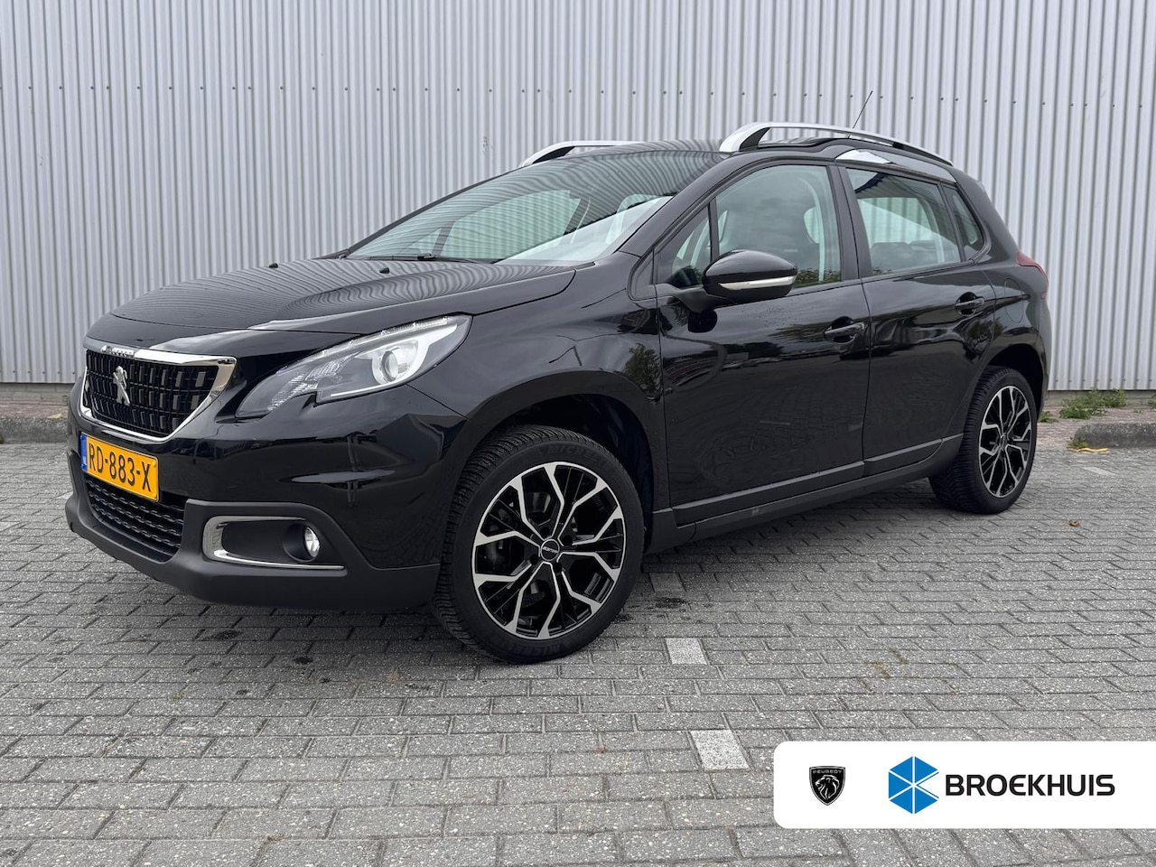 Peugeot 2008 - 1.2 110PK | Navigatie | Cruise Control | Bluetooth | Licht Metaal | | Dakrails | Parkeerse - AutoWereld.nl