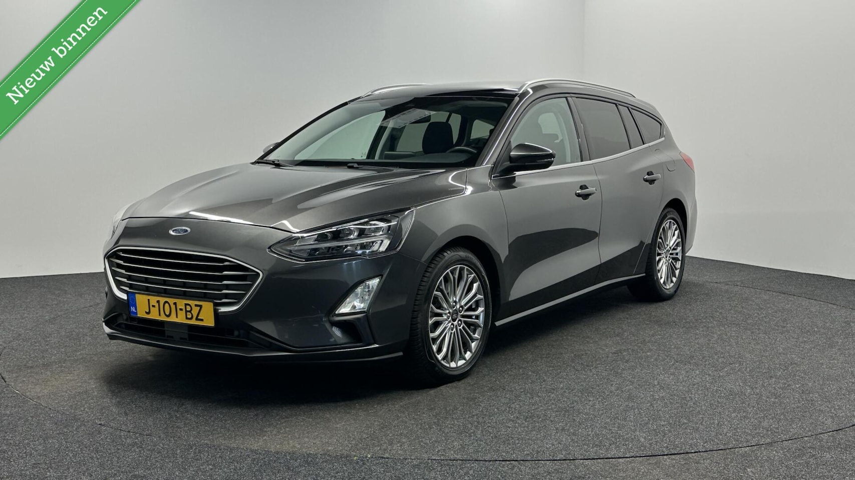 Ford Focus Wagon - 1.0 EcoBoost Titanium Business PANO TREKHAAK CRUISE NAVI CARPLAY ECC. - AutoWereld.nl
