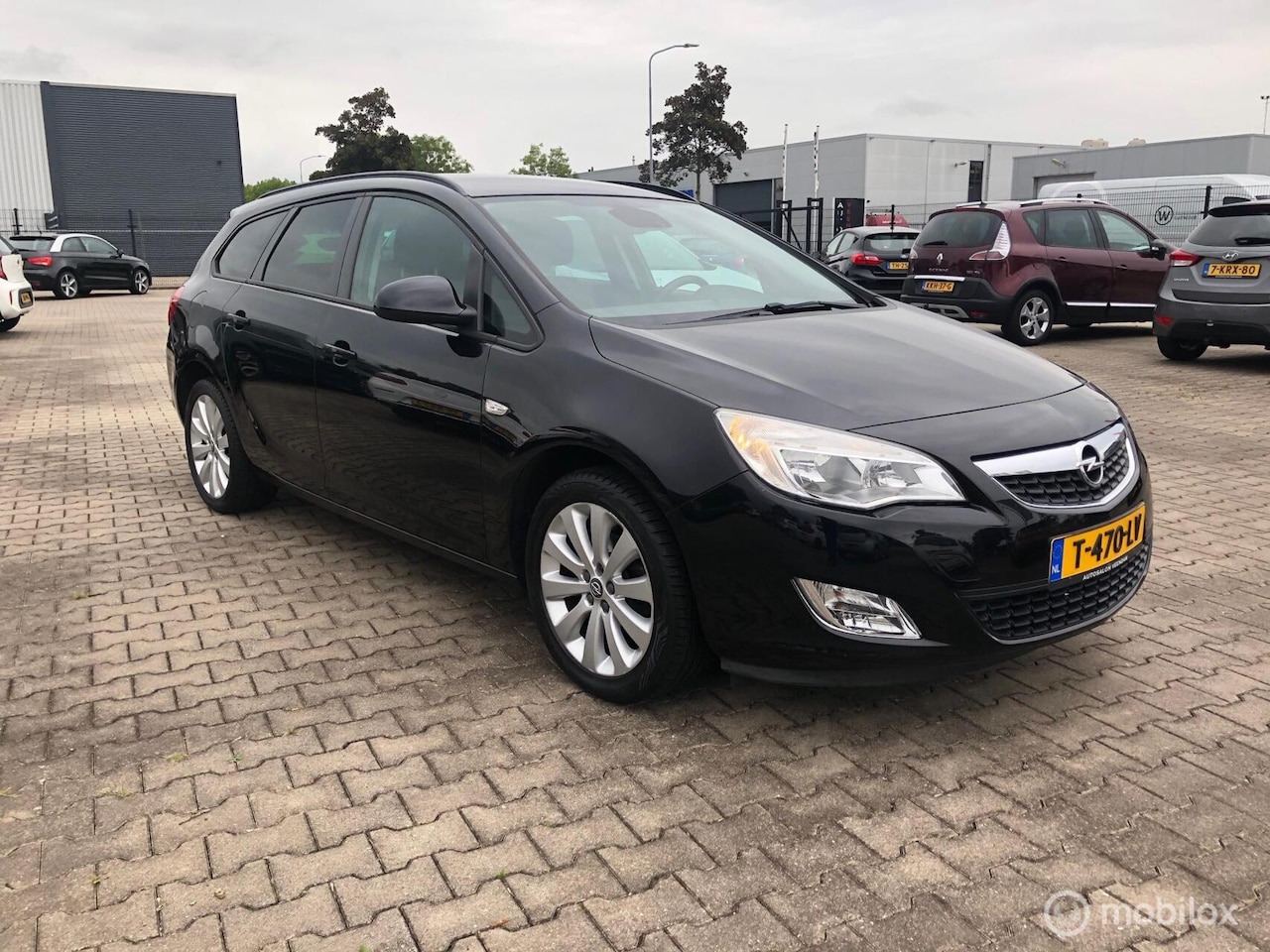 Opel Astra Sports Tourer - 1.4 Turbo Cosmo Navi Cruise Airco - AutoWereld.nl