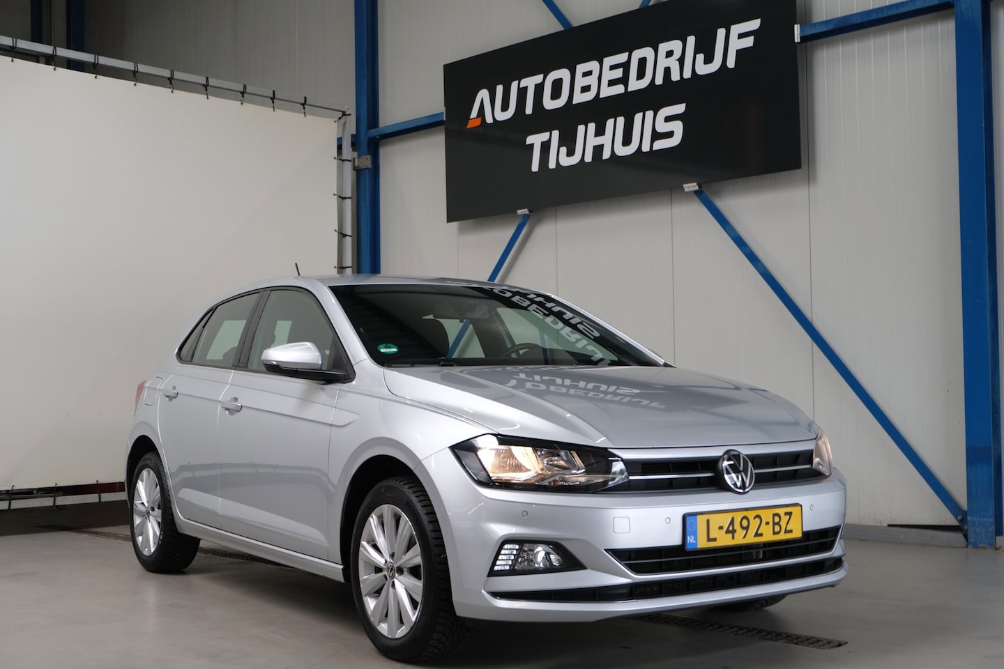 Volkswagen Polo - 1.0 TSI Highline - N.A.P. Airco, Cruise, Carplay, Navi, PDC. - AutoWereld.nl