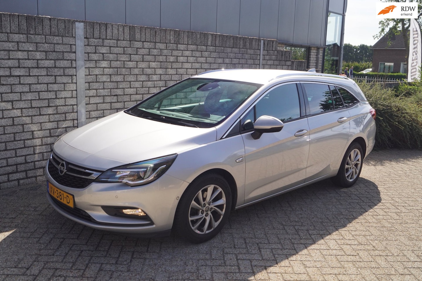 Opel Astra Sports Tourer - 1.4 Innovation Half Leder Sportst Stoel/Stuur A Bankverw Navi Camera Clima Cruise 2x PDC L - AutoWereld.nl