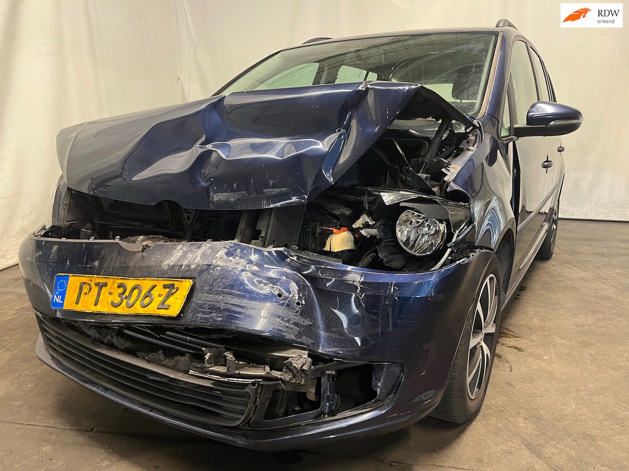 Volkswagen Touran - 1.6 TDI Highline BlueMotion 7p. 1.6 TDI Highline BlueMotion 7p. - AutoWereld.nl