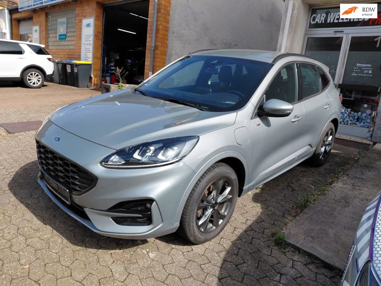 Ford Kuga - 2.5 PHEV ST-Line 18inch, pdc v+a ,navi, Sportieve auto - AutoWereld.nl