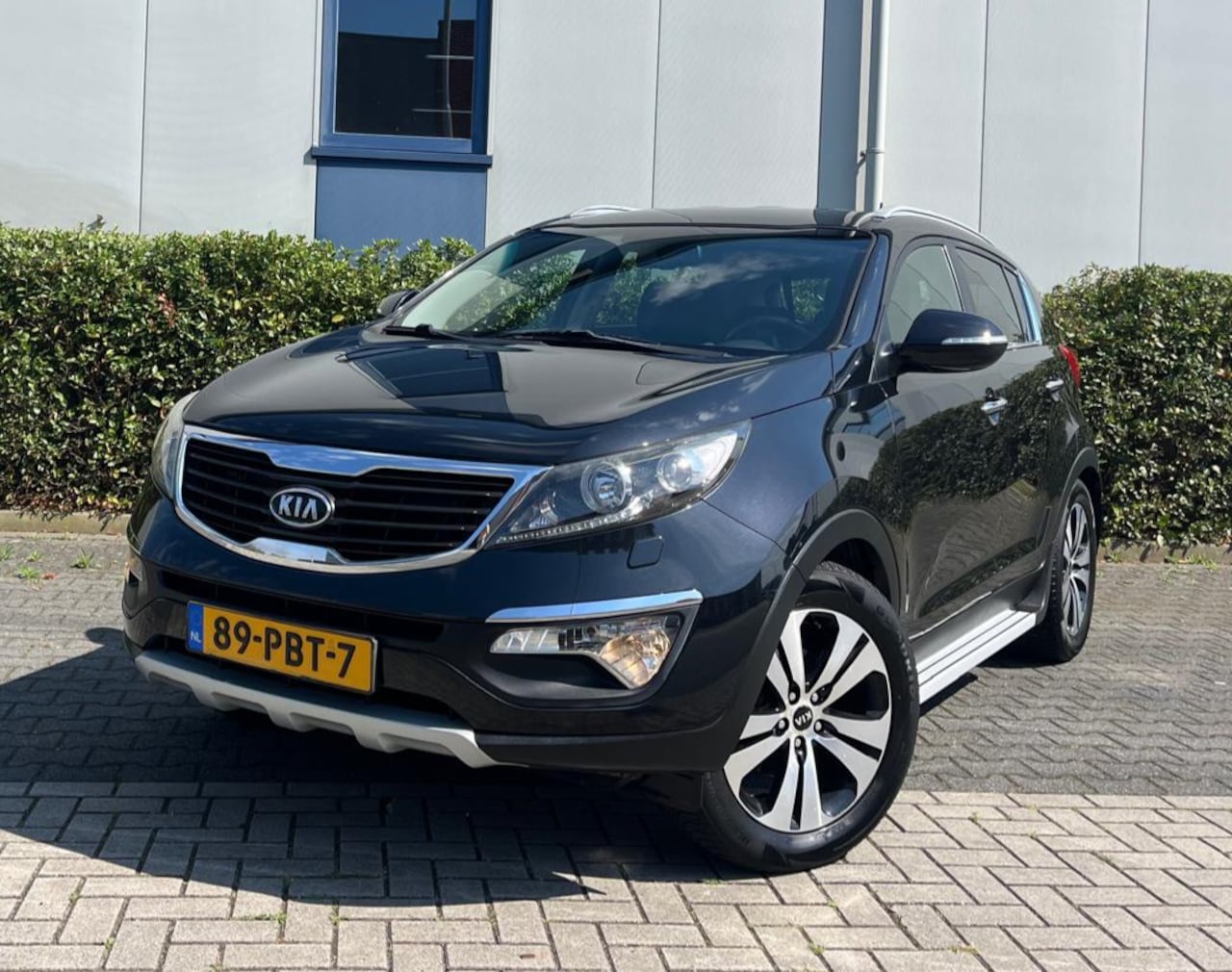 Kia Sportage - 2.0 163pk X-clusive Leder/Camera - AutoWereld.nl