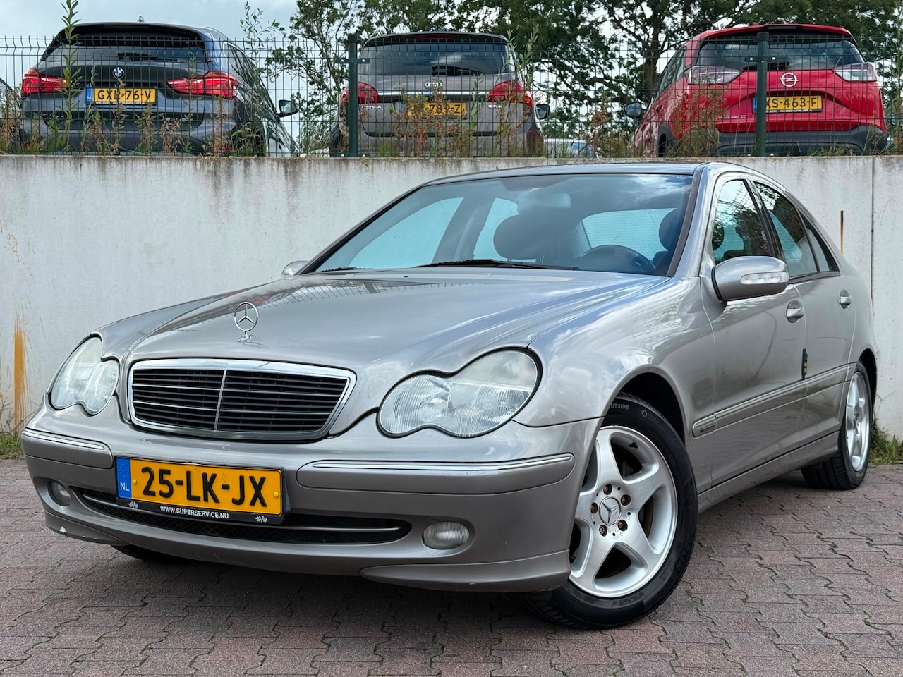Mercedes-Benz C-klasse - 180 K. Elegance/AIRCO/CRUISE/143631 KM NAP/APK 04-2027/ - AutoWereld.nl