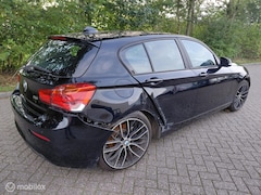 BMW 1-serie - 116I Business 6 bak - airco - cruise - navigatie