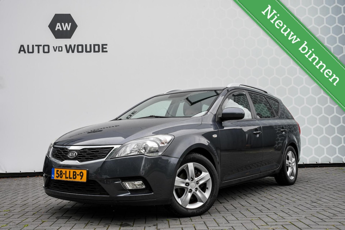 Kia Cee'd Sporty Wagon - 1.4 CVVT Seven 1.4 CVVT Seven - AutoWereld.nl