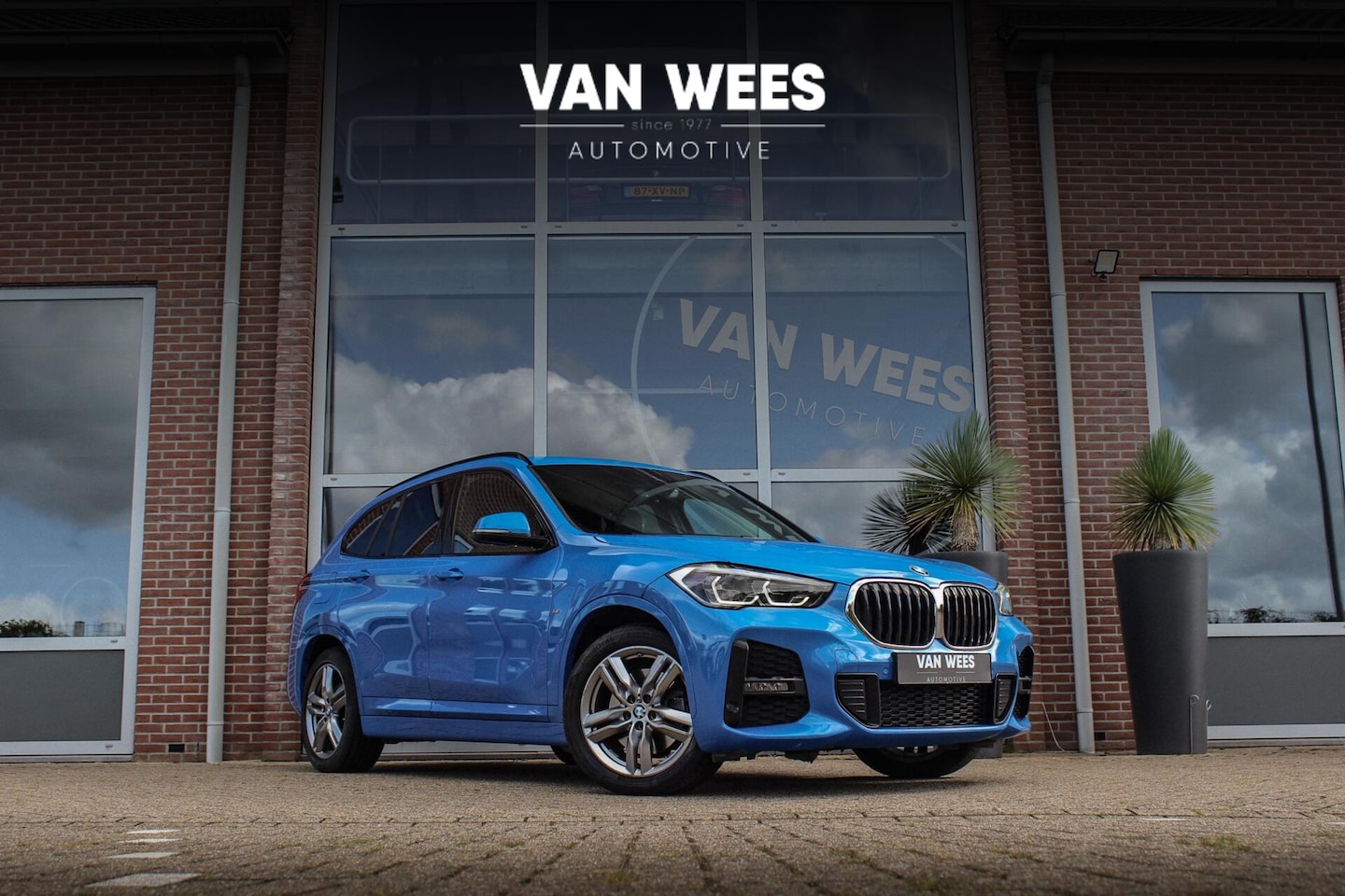 BMW X1 - xDrive25e High Executive M sport | 1e eigenaar | Dealer onderhouden | Panoramadak | Apple - AutoWereld.nl