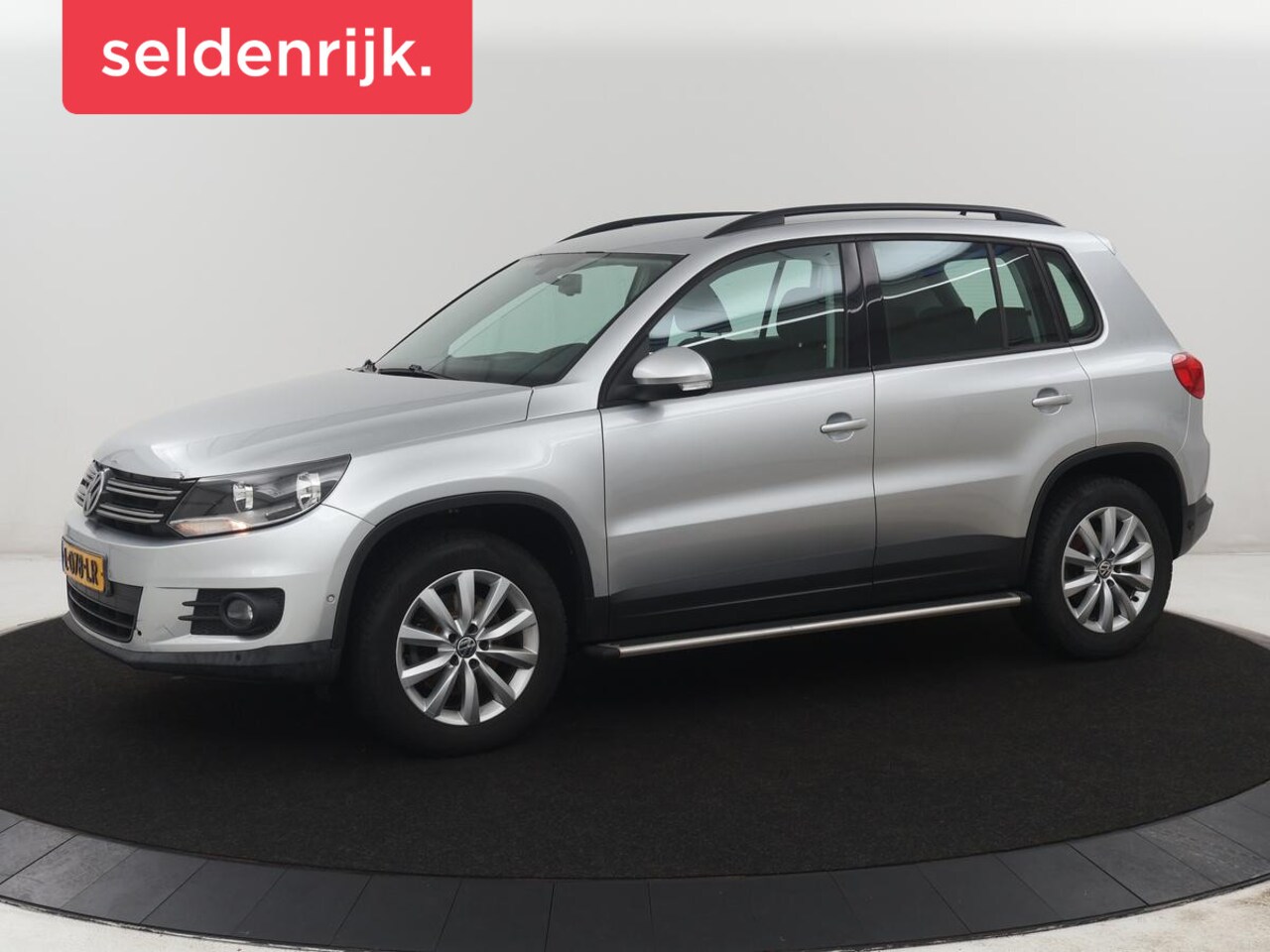 Volkswagen Tiguan - 1.4 TSI Sport&Style | Trekhaak | Cruise control | Stoelverwarming | Climate control | Blue - AutoWereld.nl