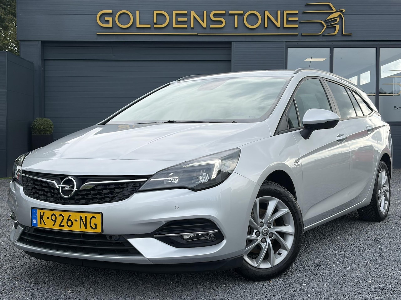 Opel Astra Sports Tourer - 1.2 Business Executive ✓1e Eigenaar✓146pk✓Camera✓Trekhaak✓Carplay✓Airco✓Cruise✓Pdc V+A✓Lm - AutoWereld.nl