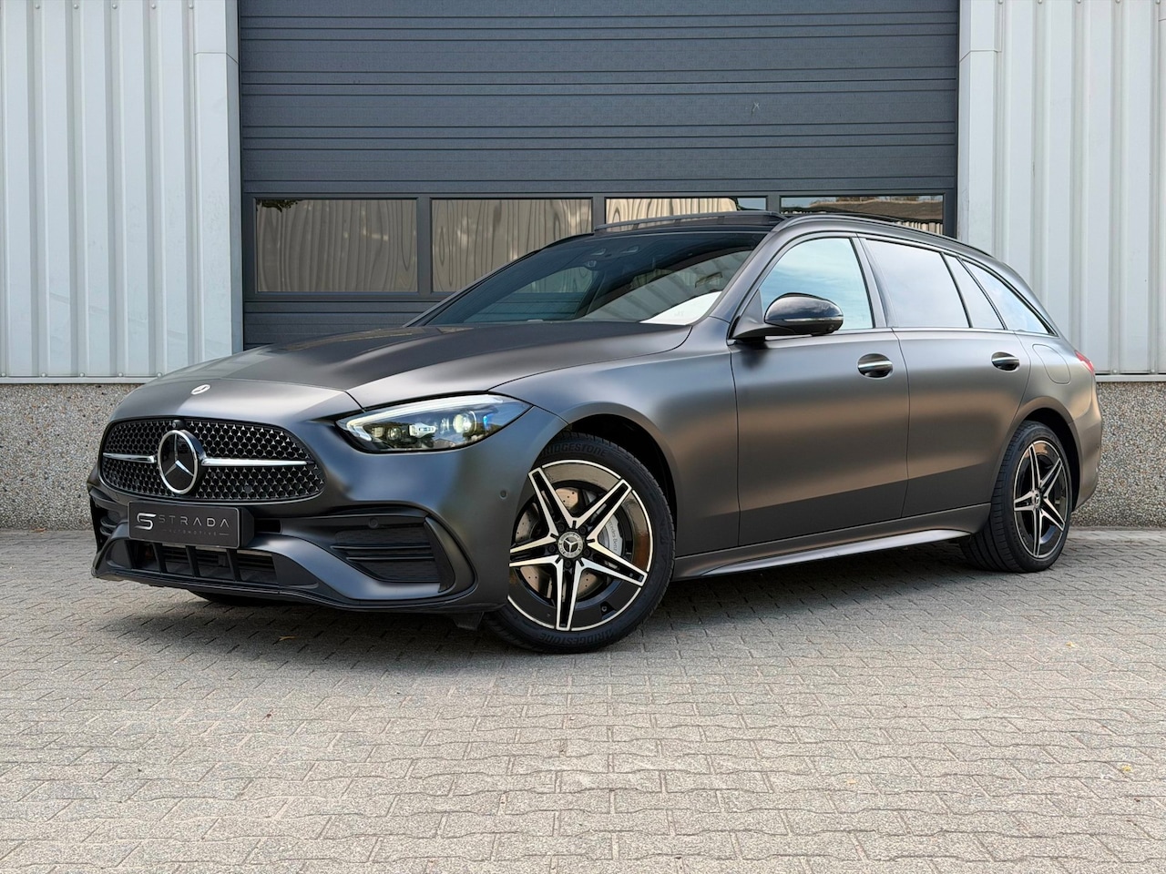 Mercedes-Benz C-klasse Estate - 300e AMG Line Prem+ Pano Trekh. - AutoWereld.nl