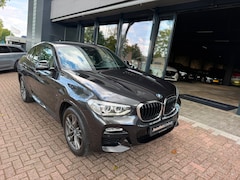 BMW X4 - XDrive20i High Executive Edition|Camera|M Sport pakket|Navigatie|Sportstoelen|Wit leer|Pra