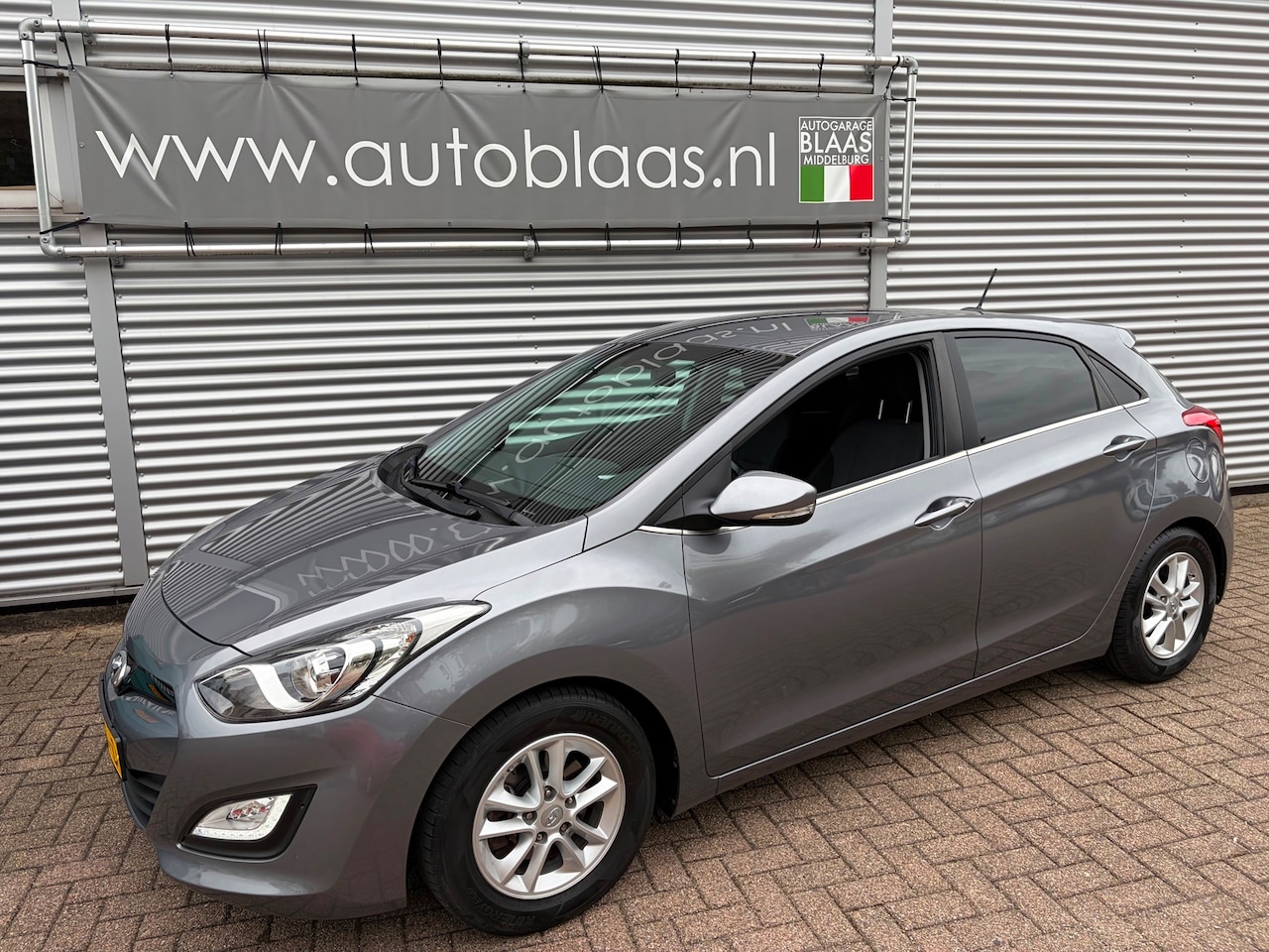 Hyundai i30 - 1.6 GDI i-Motion Plus 1.6 GDI i-Motion Plus - AutoWereld.nl