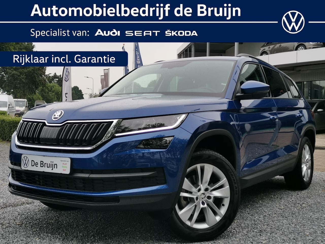 Skoda Kodiaq - 1.5 TSI 150pk DSG Bus. Edition 7p (Trekhaak,Navi,Keyless) - AutoWereld.nl