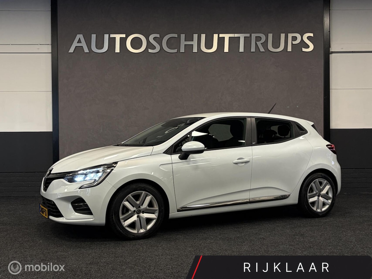 Renault Clio - 1.6 E-Tech Hybrid 140 PK AUTOMAAT / STOELVERW. / CLIMA / CRUISE / LED / CARPLAY MEDIA / - AutoWereld.nl
