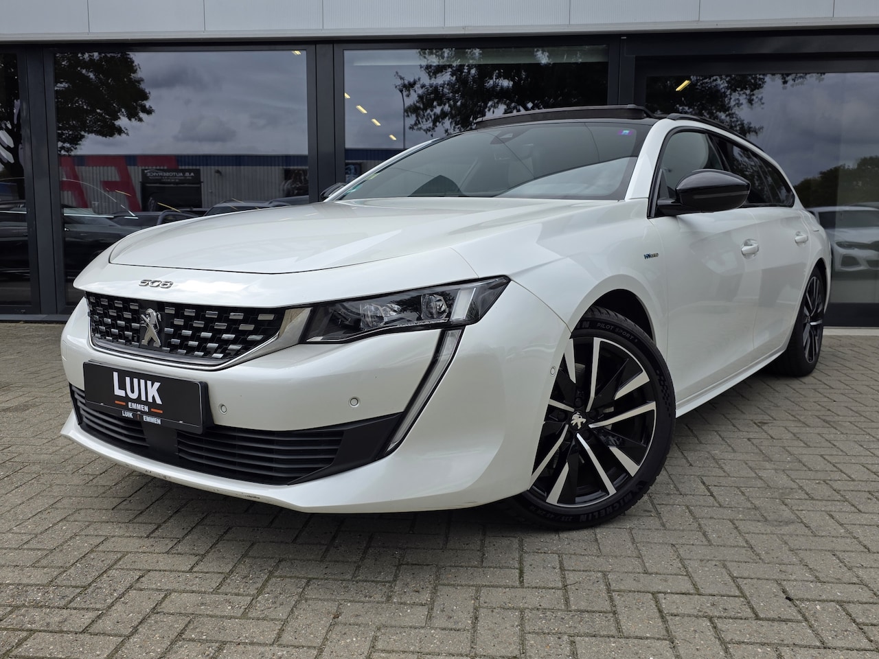 Peugeot 508 SW - 1.6 HYbrid GT + PANO DAK + MASSAGE + VOCAL SOUND + CAMERA - AutoWereld.nl