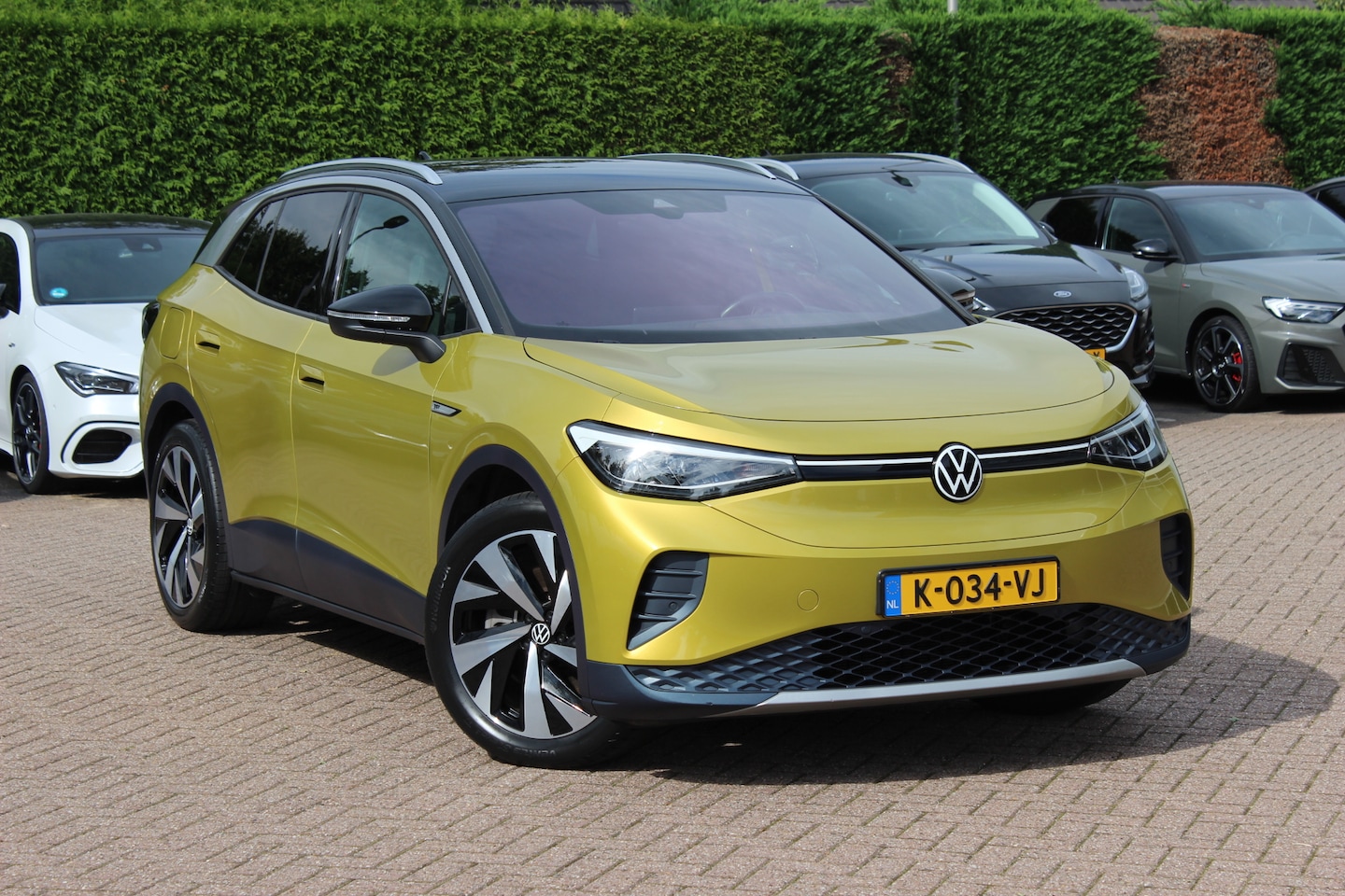 Volkswagen ID.4 - Life 77 kWh / SoH 93,9% / Trekhaak / Camera / Apple CarPlay / DAB / 20'' / LED / Alcantara - AutoWereld.nl