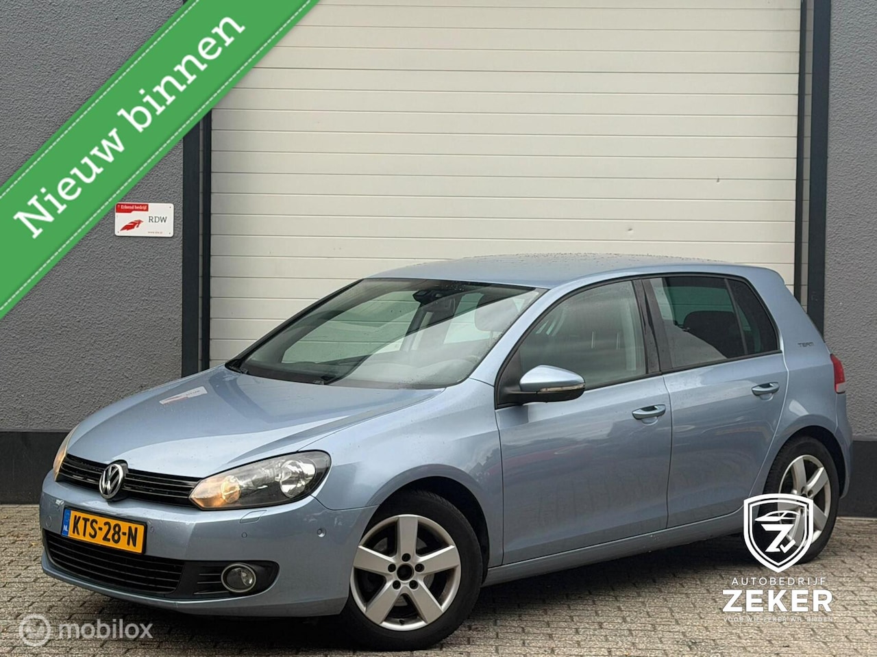 Volkswagen Golf - 1.2 TSI Highline / airco / cruise / parkeers - AutoWereld.nl